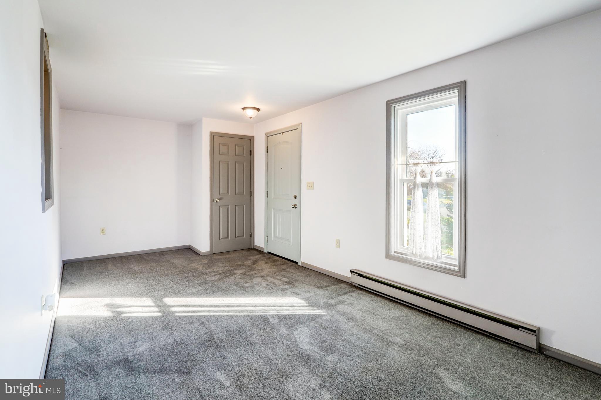 206 Pleasant Hill Drive Lititz, PA 17543 - Photo 10 of 35 an empty room with windows