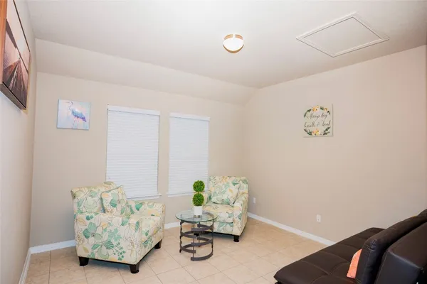 a living room with furniture and a couch