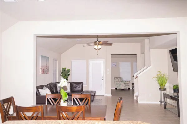 a view of a dining room with furniture