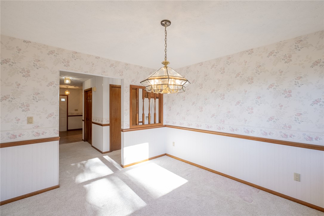 276 South Fairfield Road Bellbrook, OH 45305 - Photo 8 of 38 This bright room features a classic chandelier, offering a perfect canvas for your personal style.