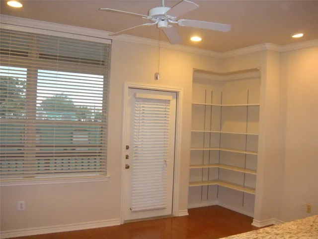 a view of a bedroom with a window