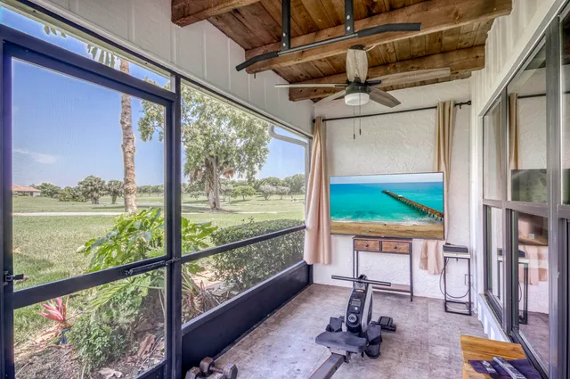 a view of swimming pool with a patio