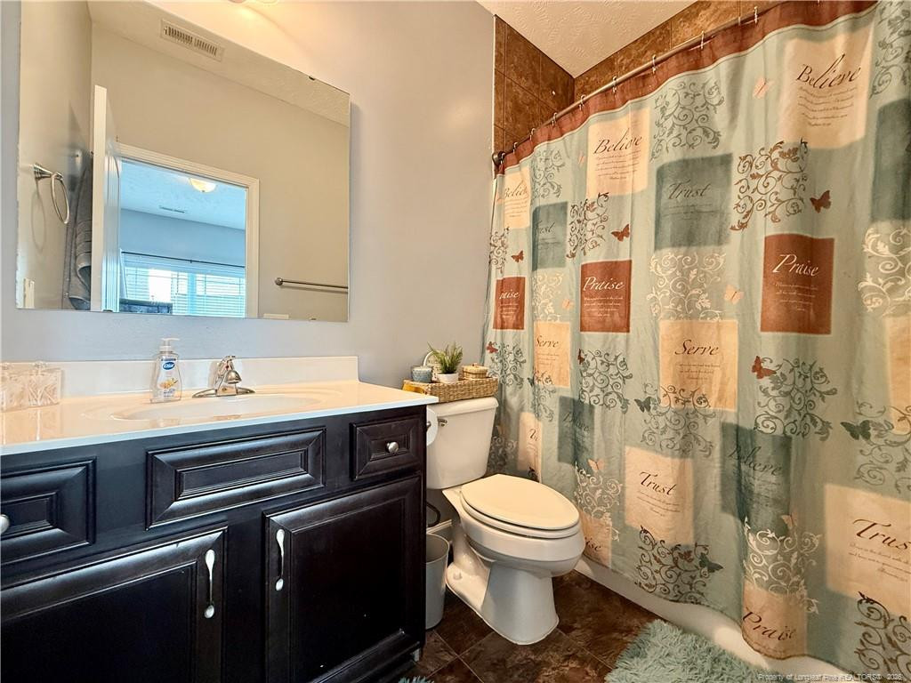 35 Ambrose Point Cameron, NC 28326 - Photo 14 of 31 a bathroom with a sink toilet and shower