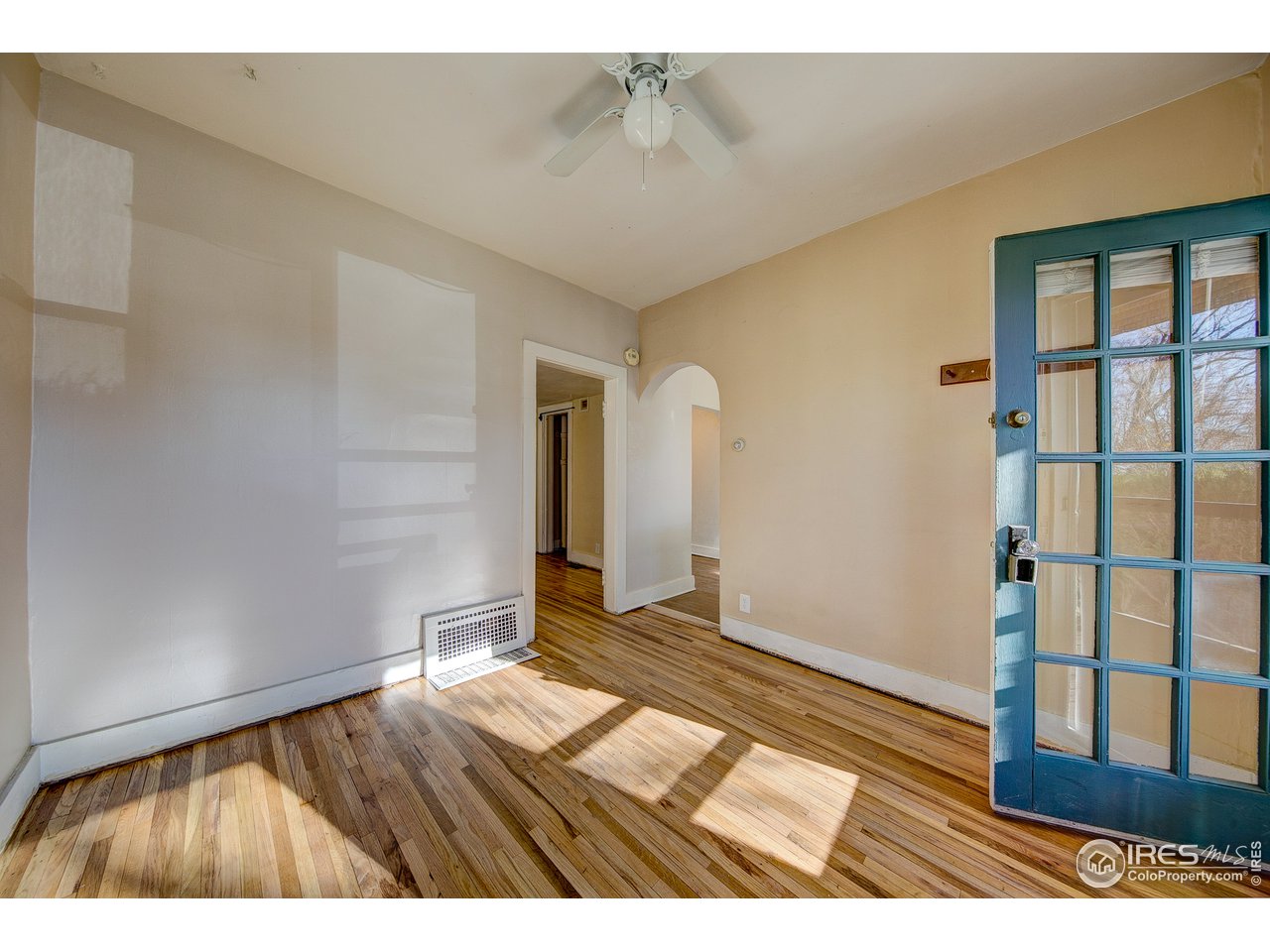 1018 Akin Avenue Fort Collins, CO 80521 - Photo 21 of 40 Living room with refinished original hardwood floors.