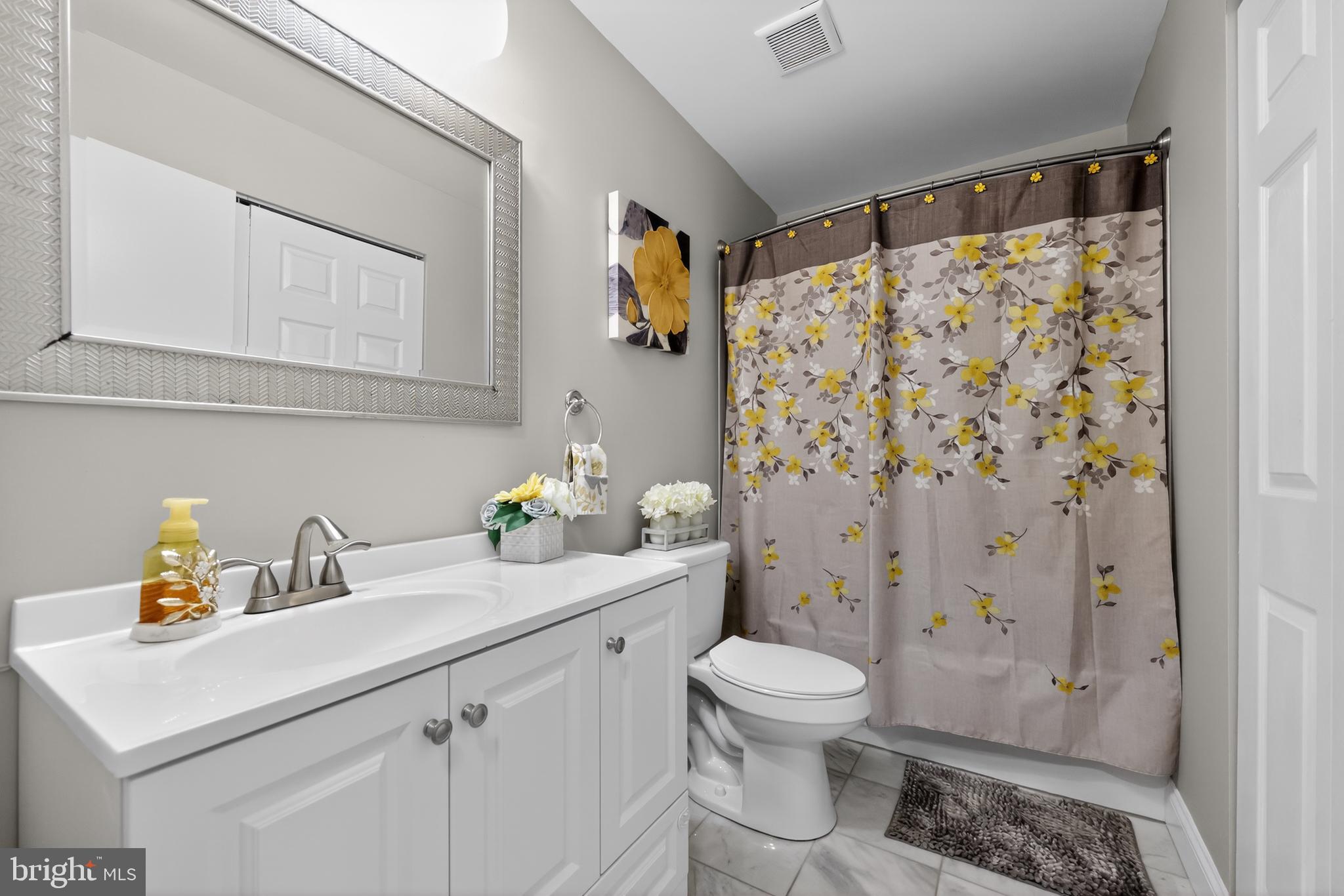 213 Tavistock Road Cherry Hill, NJ 08034 - Photo 16 of 24 a bathroom with a sink toilet and shower