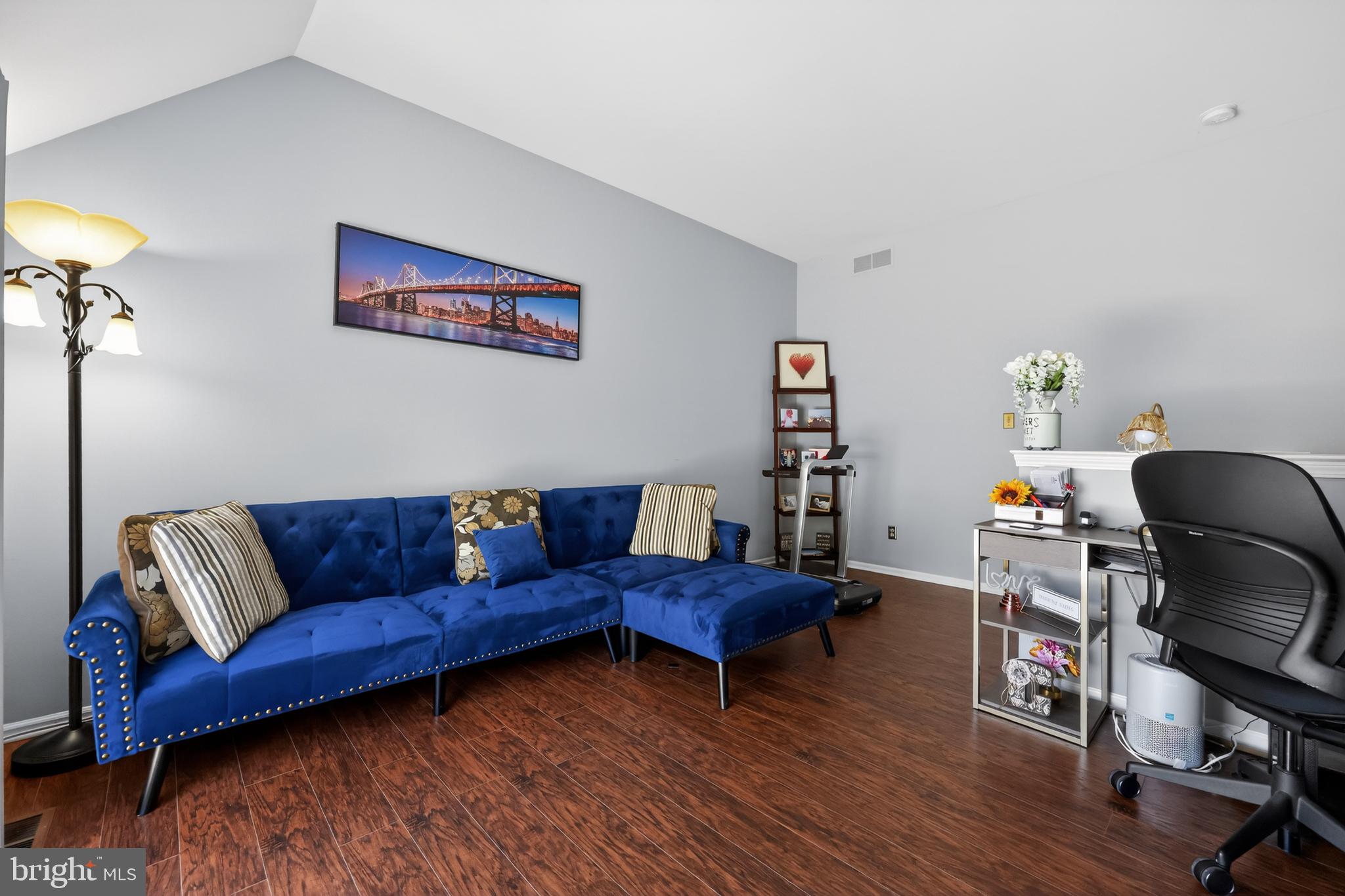 213 Tavistock Road Cherry Hill, NJ 08034 - Photo 18 of 24 a living room with furniture and a wooden floor