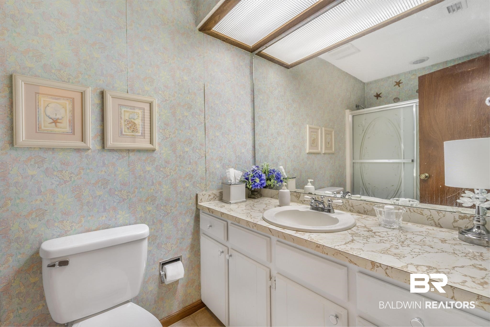 10207 Plantation Drive Daphne, AL 36526 - Photo 27 of 48 Full bath featuring vanity, a shower with shower door, and wallpapered walls