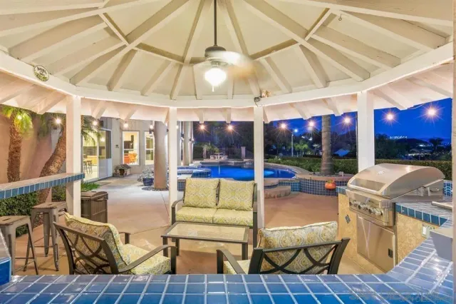 a large living room with furniture