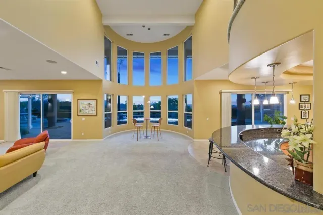 a room with furniture and pool table