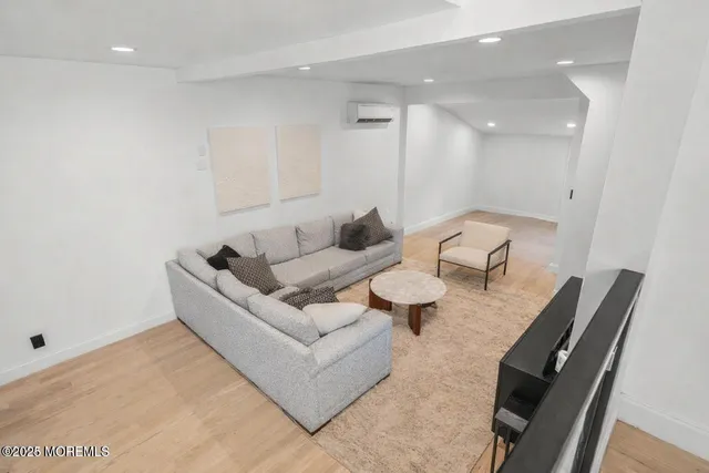 a living room with furniture and a table