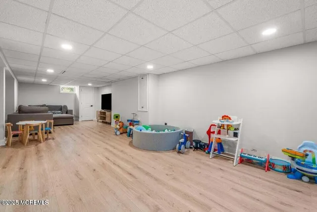 a room with furniture and a wooden floor