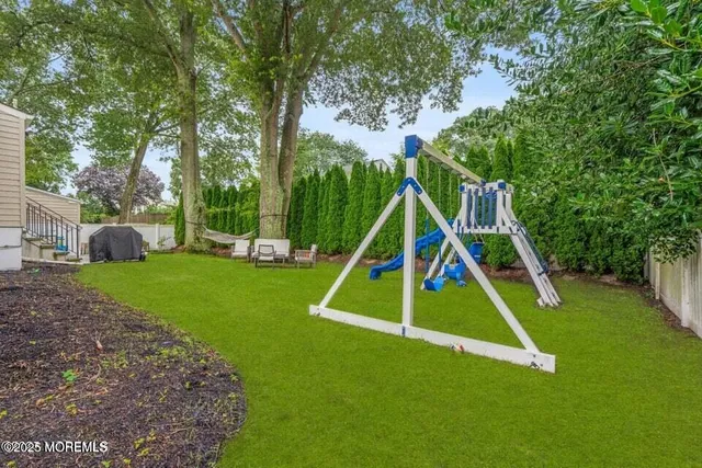a view of a park with a slide