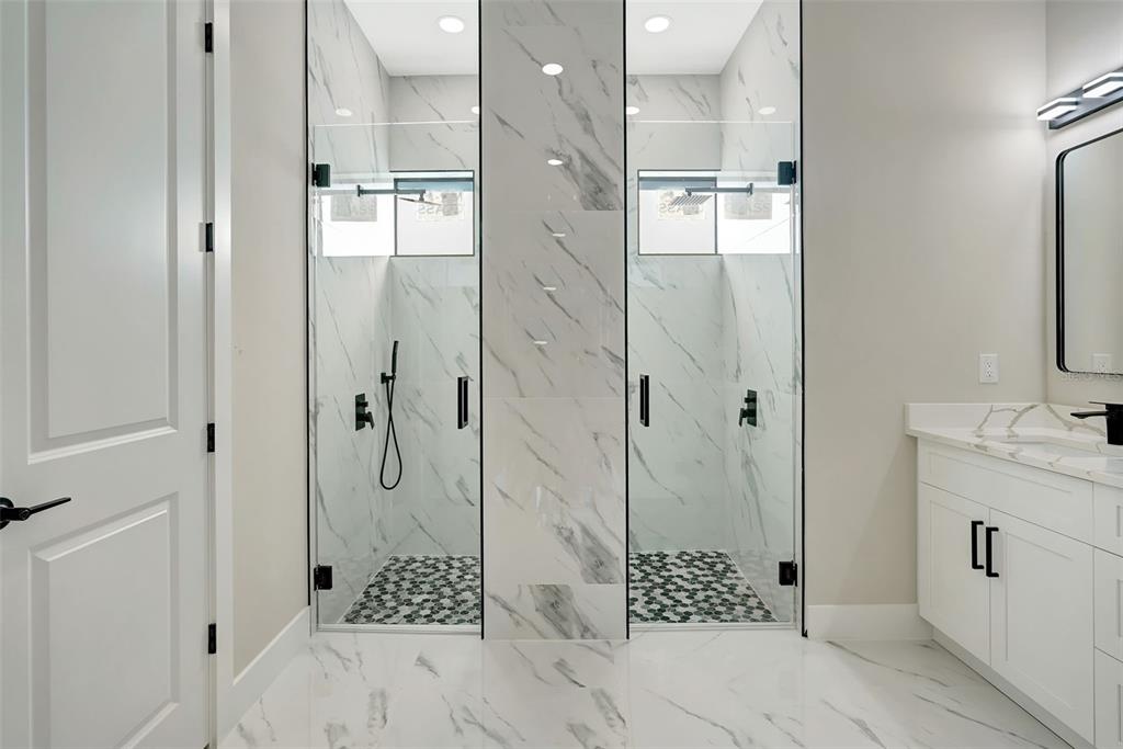 212 Fairway Road Rotonda West, FL 33947 - Photo 26 of 65 a bathroom with a shower and a sink