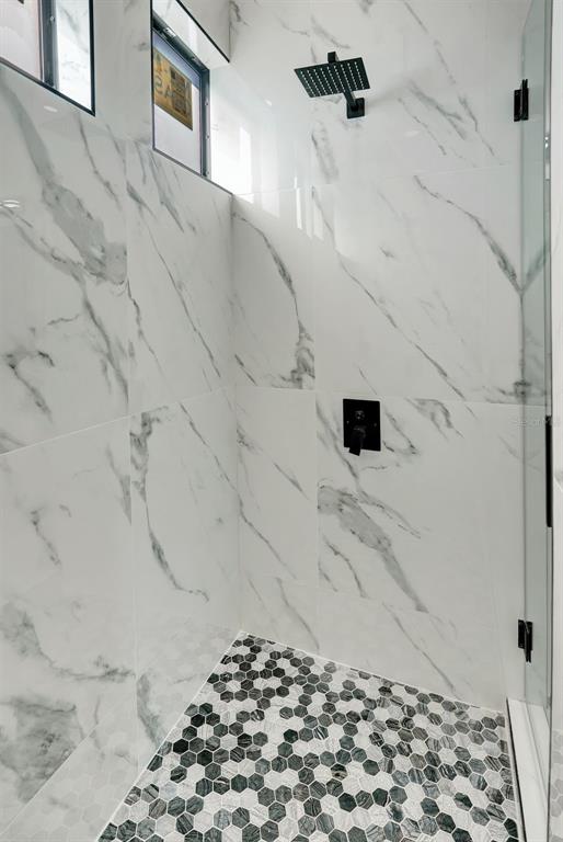 212 Fairway Road Rotonda West, FL 33947 - Photo 31 of 65 a bathroom with a shower