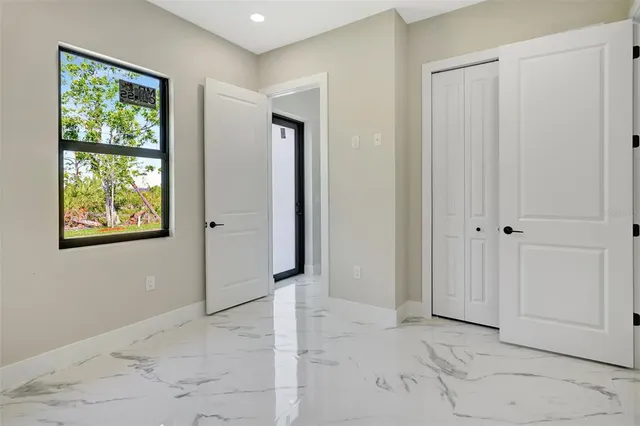 an empty room with windows