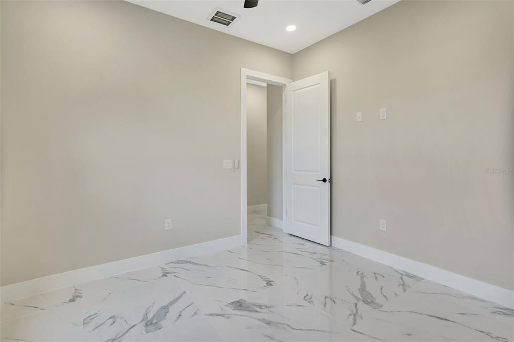 212 Fairway Road Rotonda West, FL 33947 - Photo 42 of 65 a view of an empty room