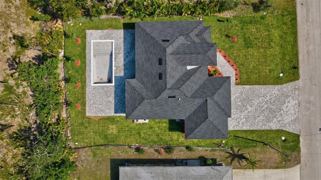 212 Fairway Road Rotonda West, FL 33947 - Photo 58 of 65 an aerial view of a house with a yard