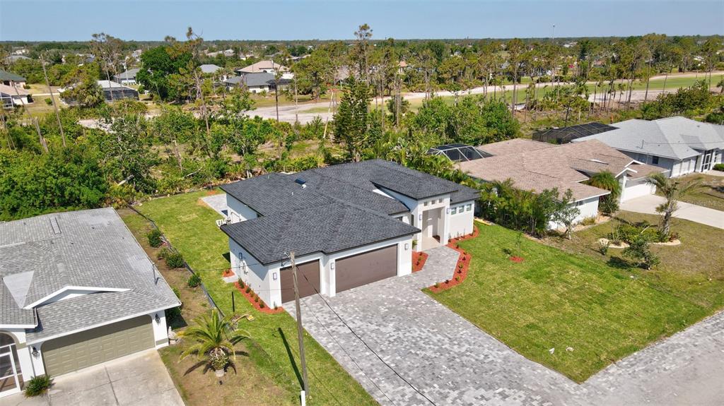 212 Fairway Road Rotonda West, FL 33947 - Photo 63 of 65 an aerial view of residential houses with outdoor space