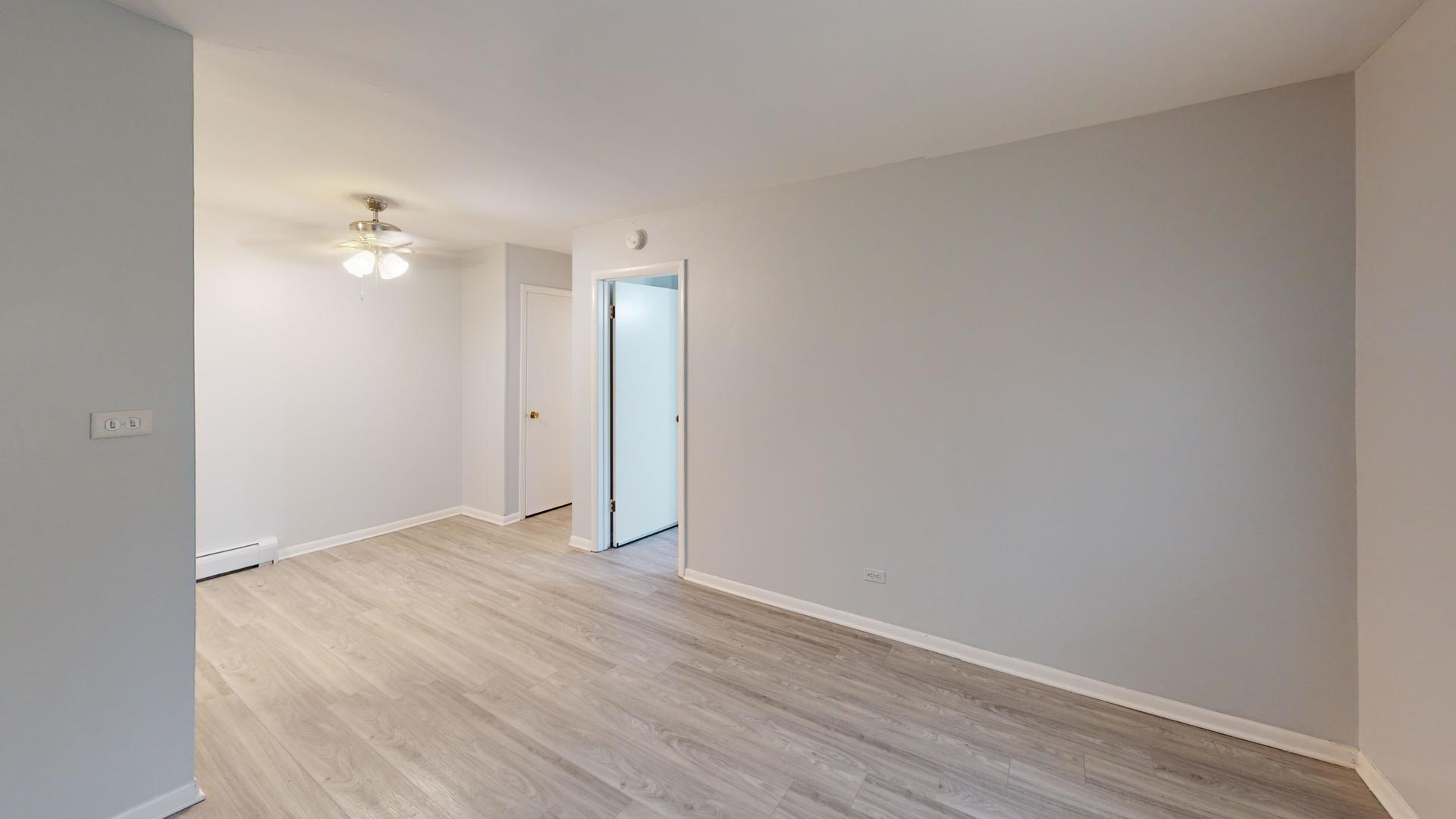 501 Chicago Road, Unit 11 Thornton, IL 60476 - Photo 8 of 8 wooden floor in an empty room