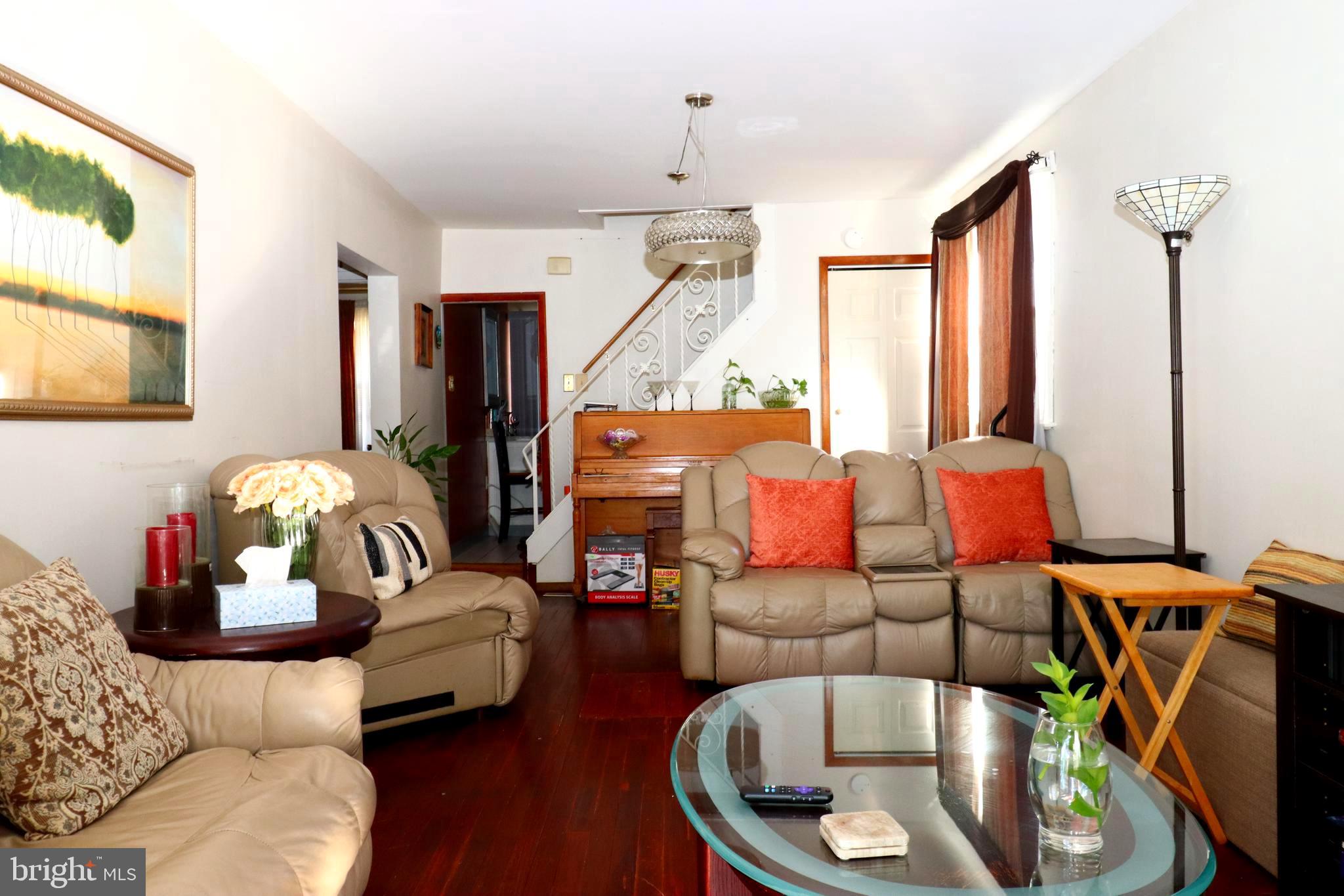 850 Orchard Avenue Runnemede, NJ 08078 - Photo 8 of 26 a living room with furniture a air conditioner and a window