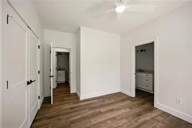 a view of a bathroom with a sink and a mirror