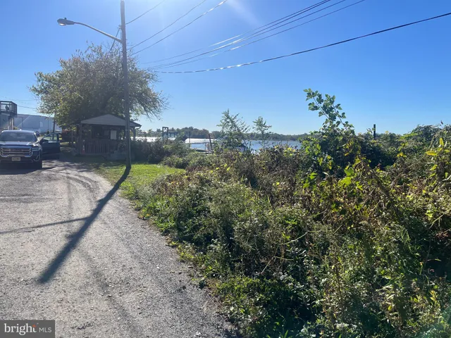 a view of a field with an houses