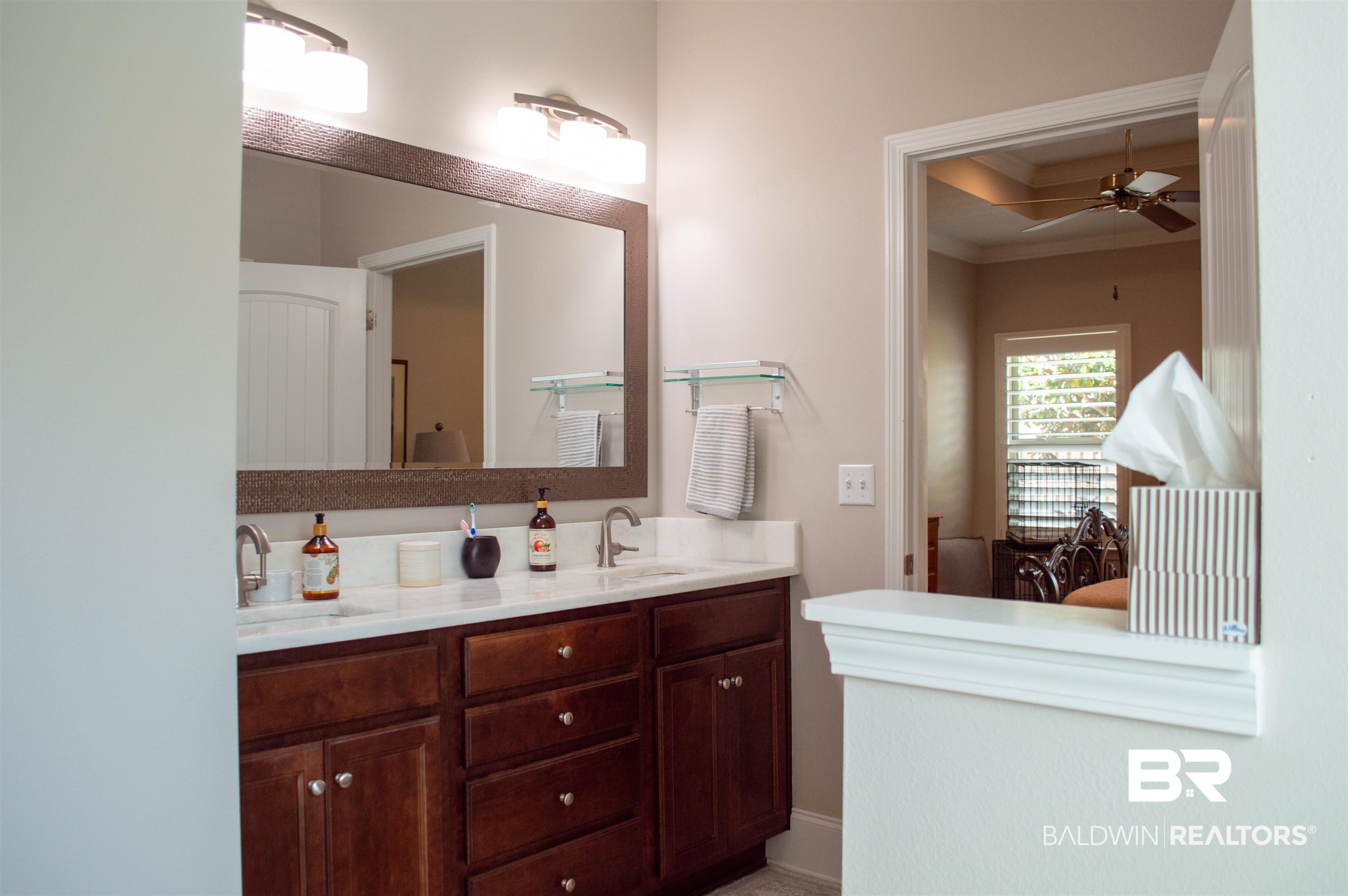 1124 West Orlando Drive Foley, AL 36535 - Photo 27 of 51 Full bath featuring ensuite bath, double vanity, a ceiling fan, and ornamental molding