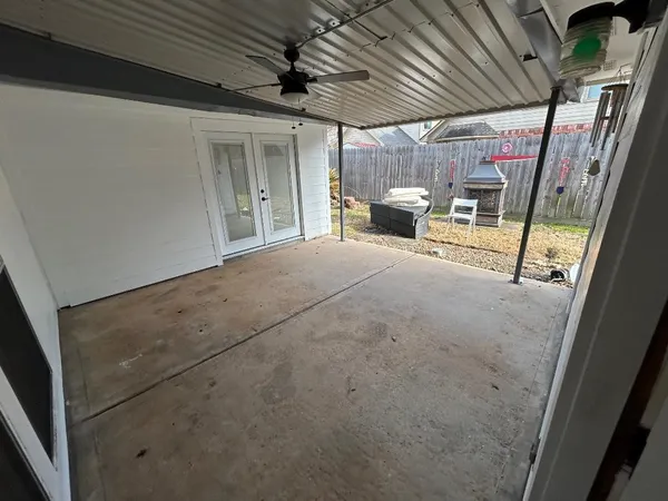 a view of a room with windows