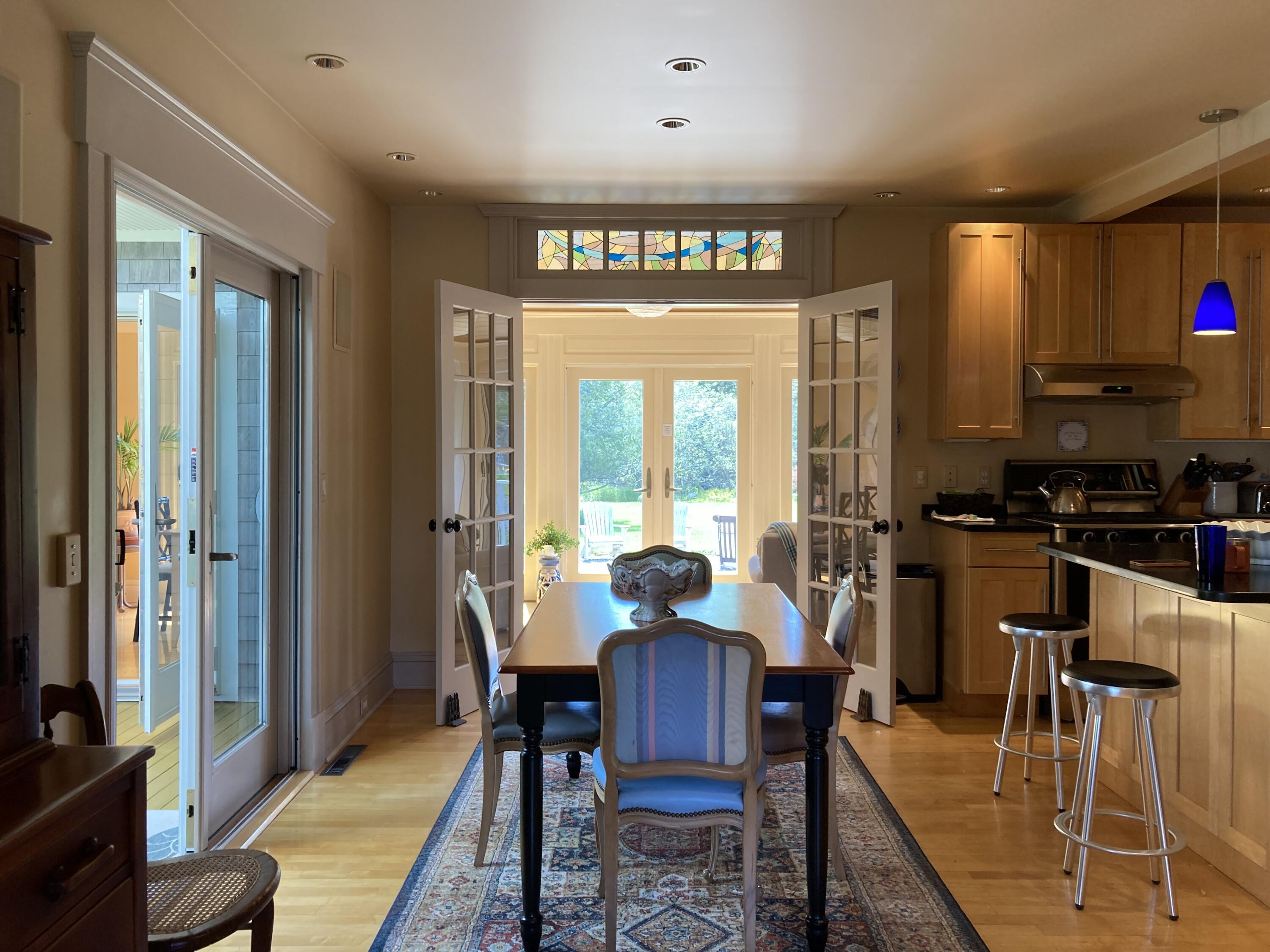 635 Corea Road Corea, ME 04624 - Photo 11 of 35 Dining area opening to porch.