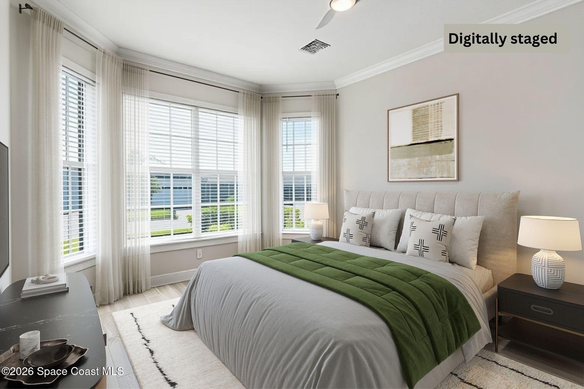 3032 Tidepool Place Melbourne, FL 32940 - Photo 23 of 67 a bedroom with a bed and wooden floor