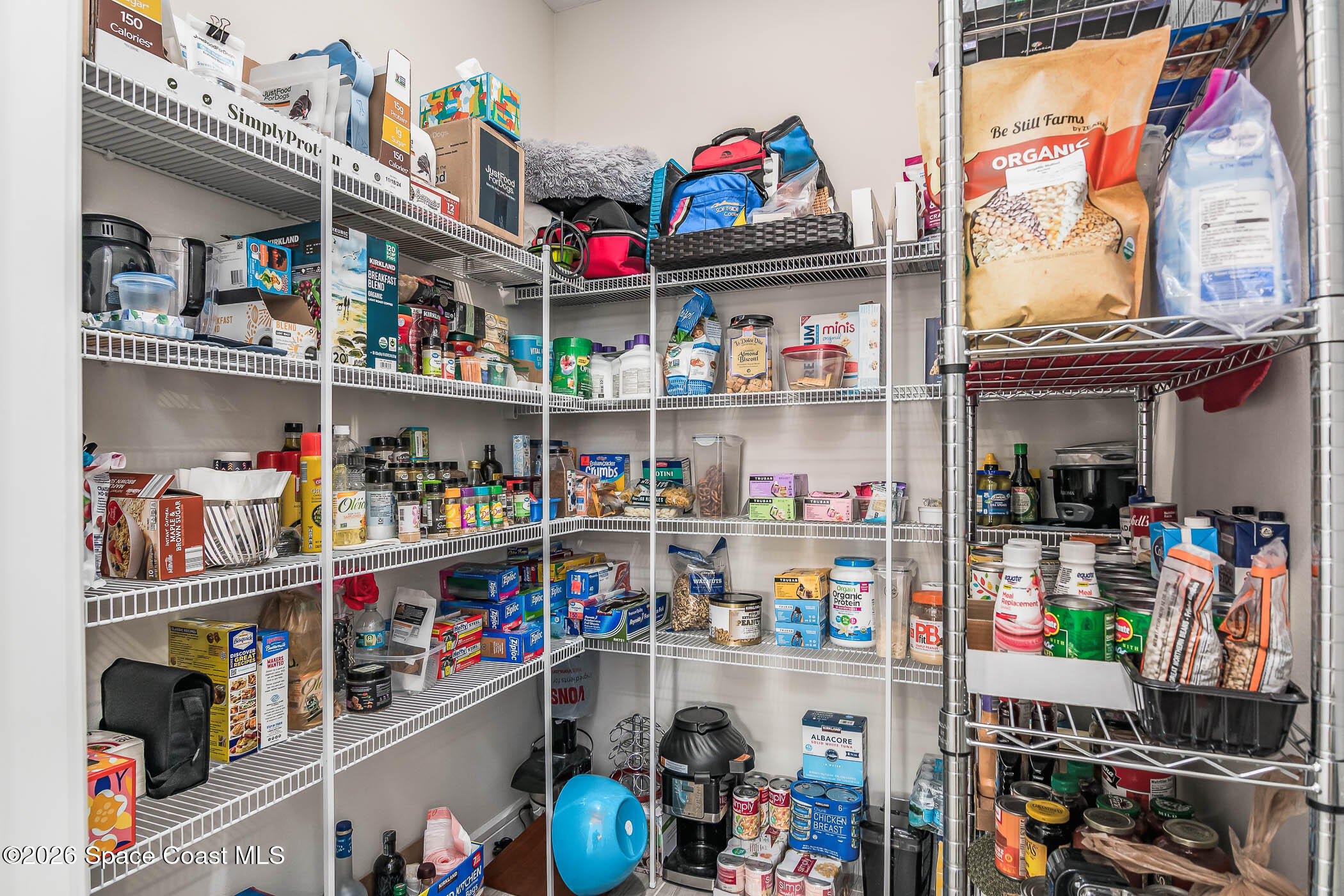3032 Tidepool Place Melbourne, FL 32940 - Photo 29 of 67 a store room with lots of different kinds of food