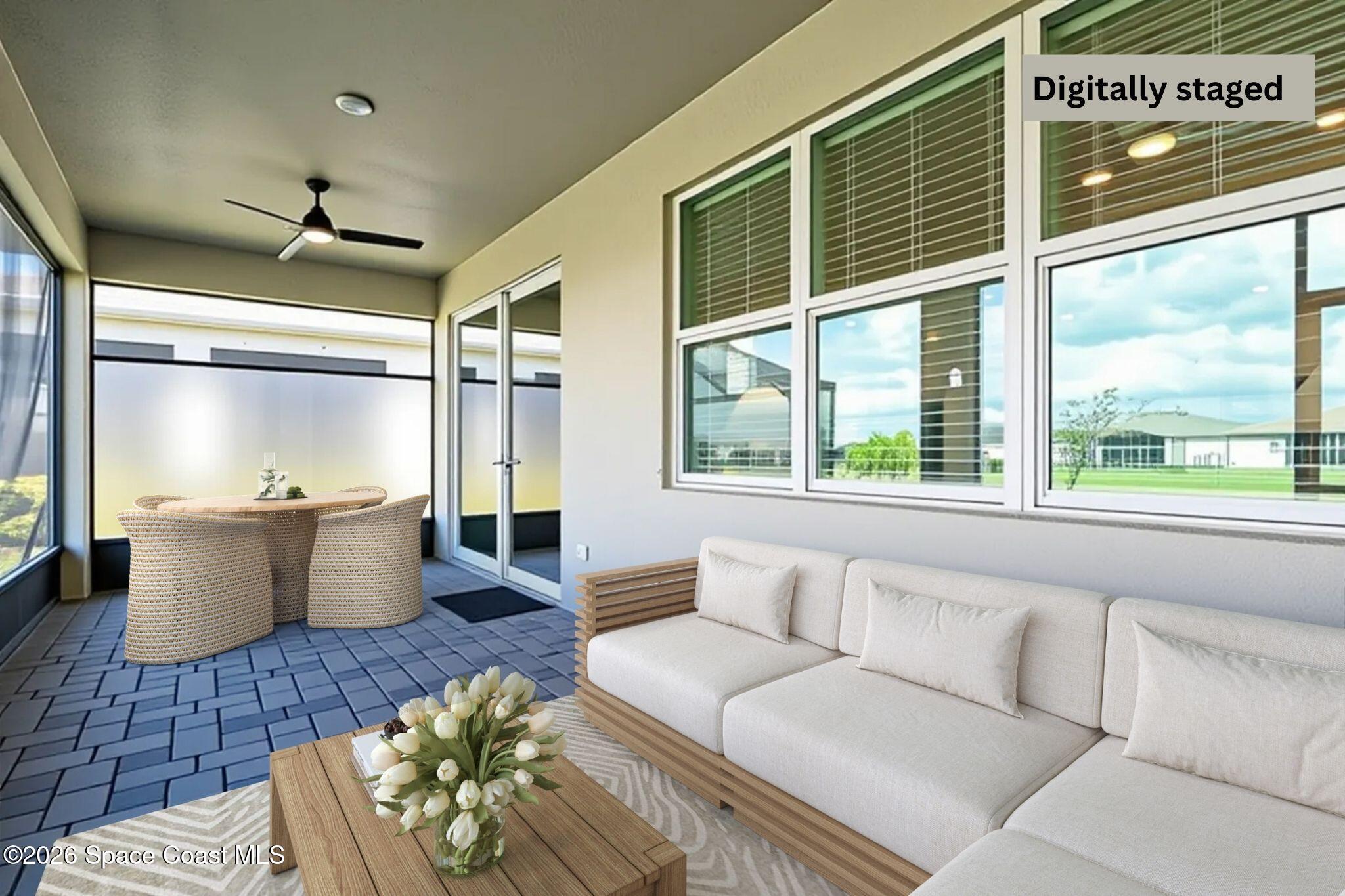 3032 Tidepool Place Melbourne, FL 32940 - Photo 30 of 67 a living room with furniture and a large window