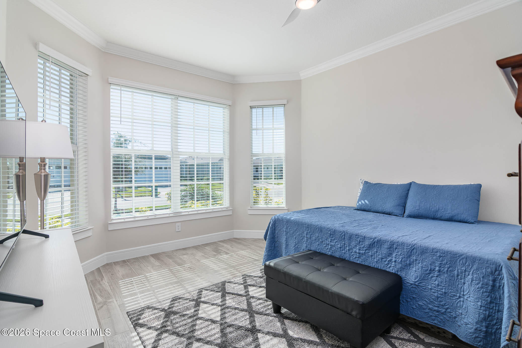 3032 Tidepool Place Melbourne, FL 32940 - Photo 55 of 67 a living room with a couch next to a large window