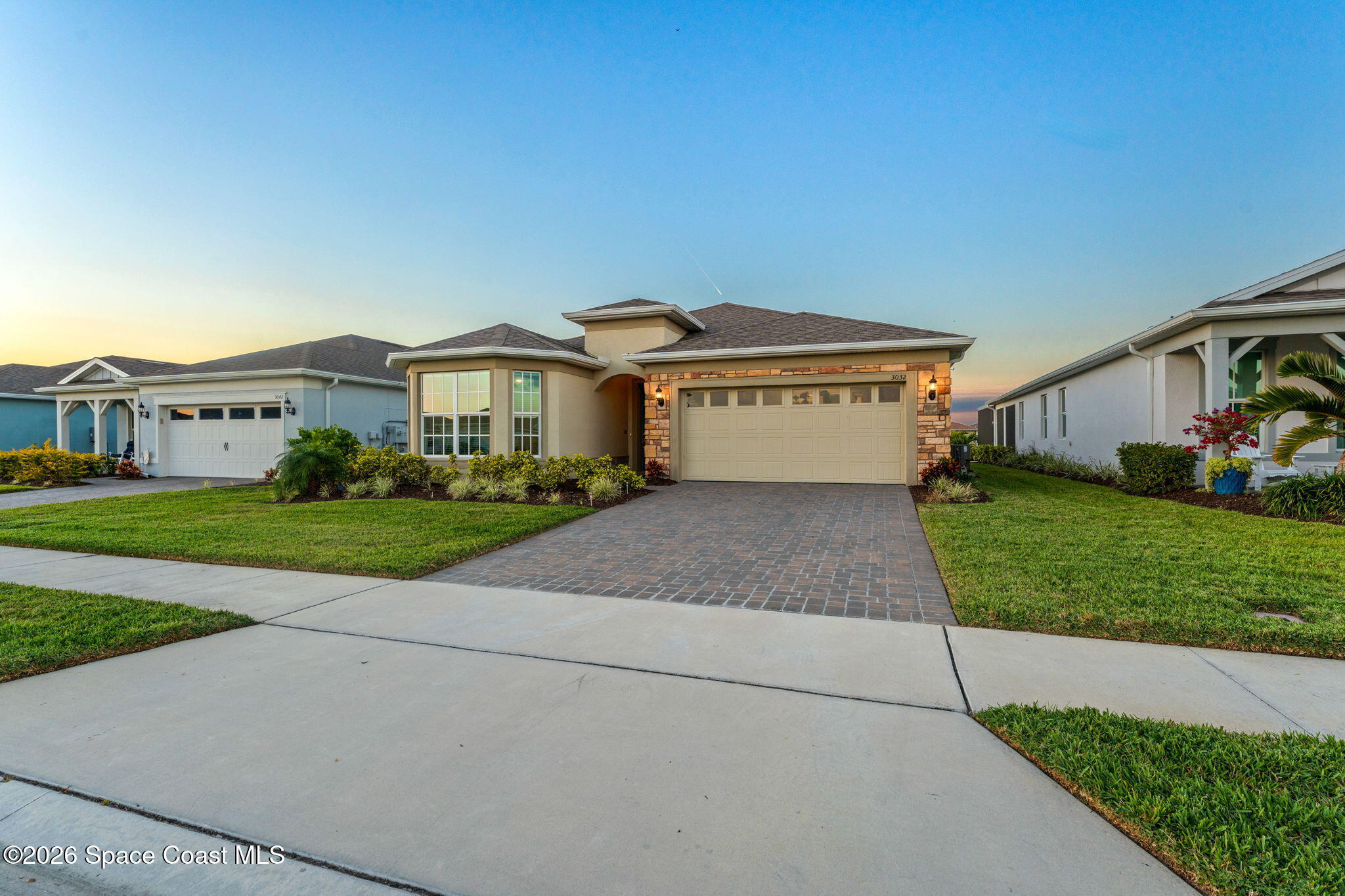 3032 Tidepool Place Melbourne, FL 32940 - Photo 58 of 67 a front view of house with yard