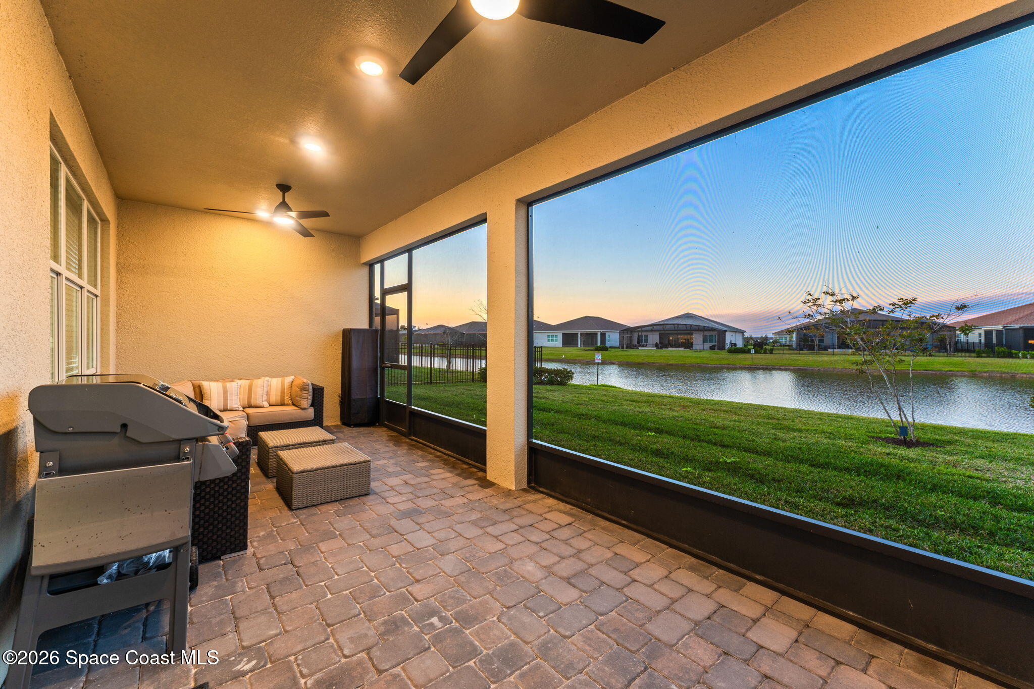 3032 Tidepool Place Melbourne, FL 32940 - Photo 60 of 67 Screened porch with tranquil pond views