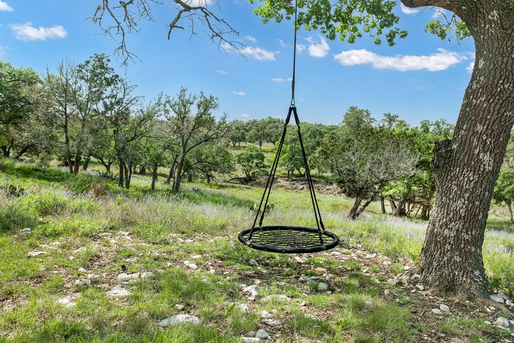 181 Real Lake House Road South Kerrville, TX 78028 - Photo 5 of 18 a view of a garden