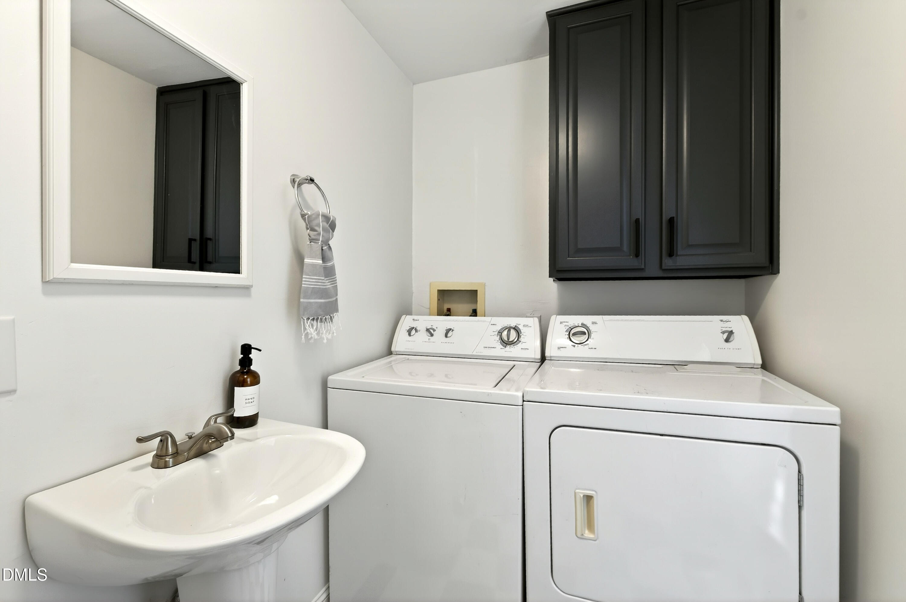 913 Washington Street Durham, NC 27701 - Photo 28 of 37 a bathroom with a sink and a toilet