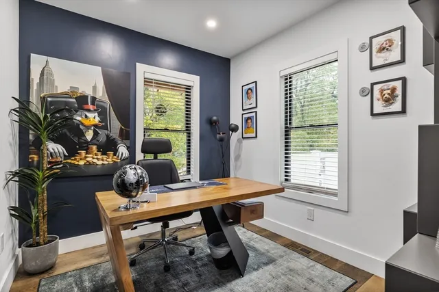 a workspace with furniture and window