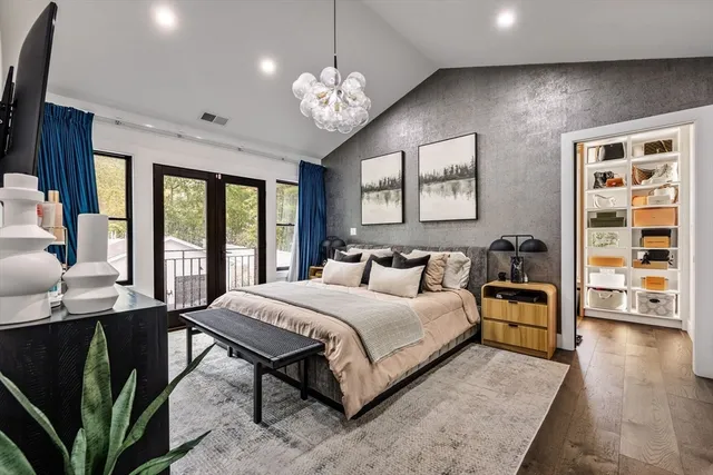 a kitchen with a refrigerator and a stove