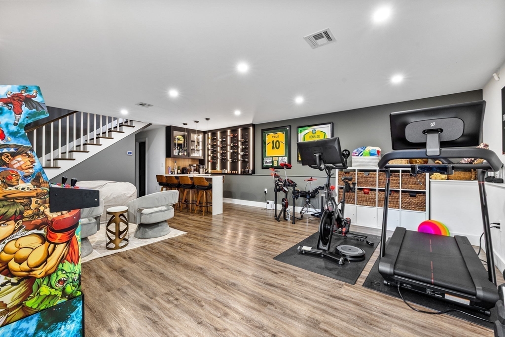 973 Main Street Lynnfield, MA 01940 - Photo 27 of 37 a living room with furniture and wooden floor