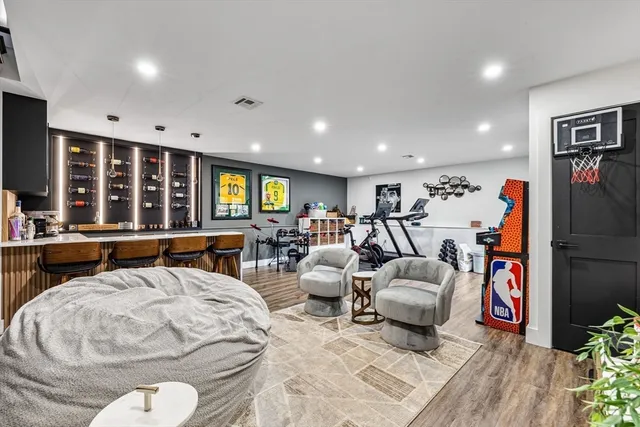 a dining table with chairs and window