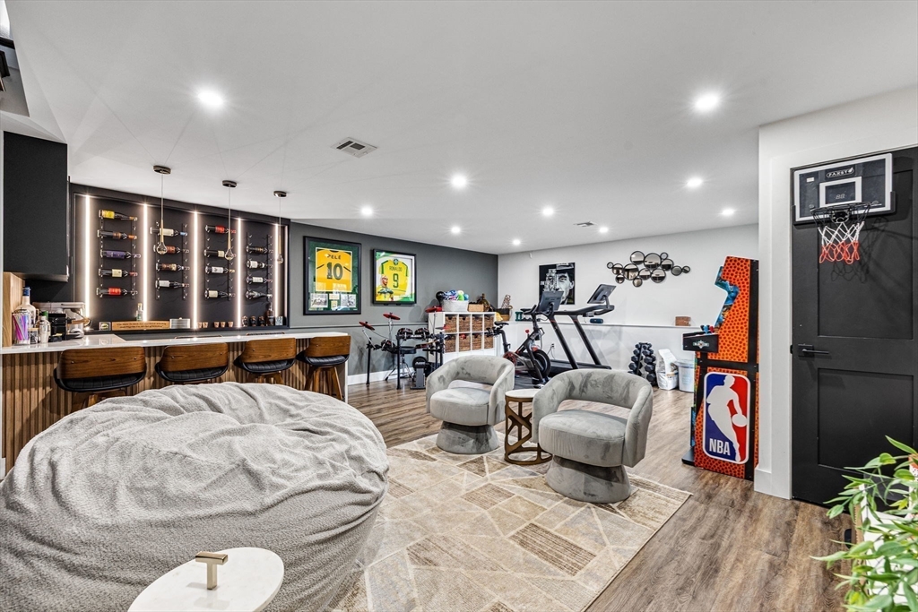 973 Main Street Lynnfield, MA 01940 - Photo 28 of 37 a living room with furniture kitchen view and a large window