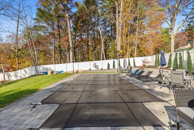 a view of a swimming pool with an outdoor space