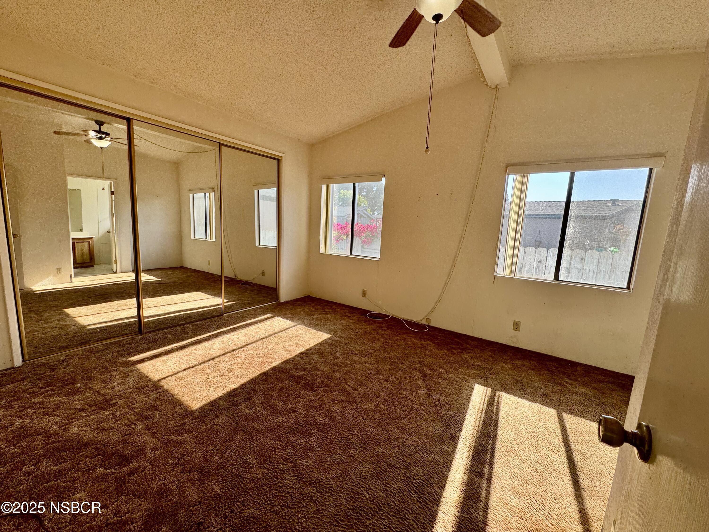 1317 V Street, Unit 58 Lompoc, CA 93436 - Photo 13 of 34 a view of an empty room and window