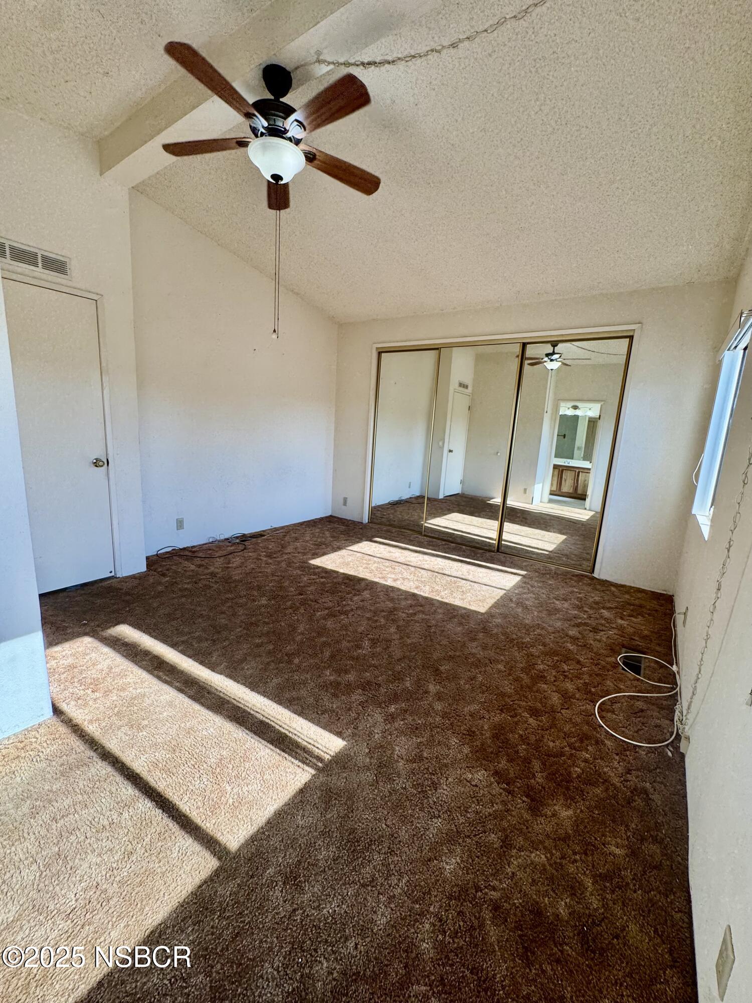 1317 V Street, Unit 58 Lompoc, CA 93436 - Photo 14 of 34 a view of a room with a ceiling fan