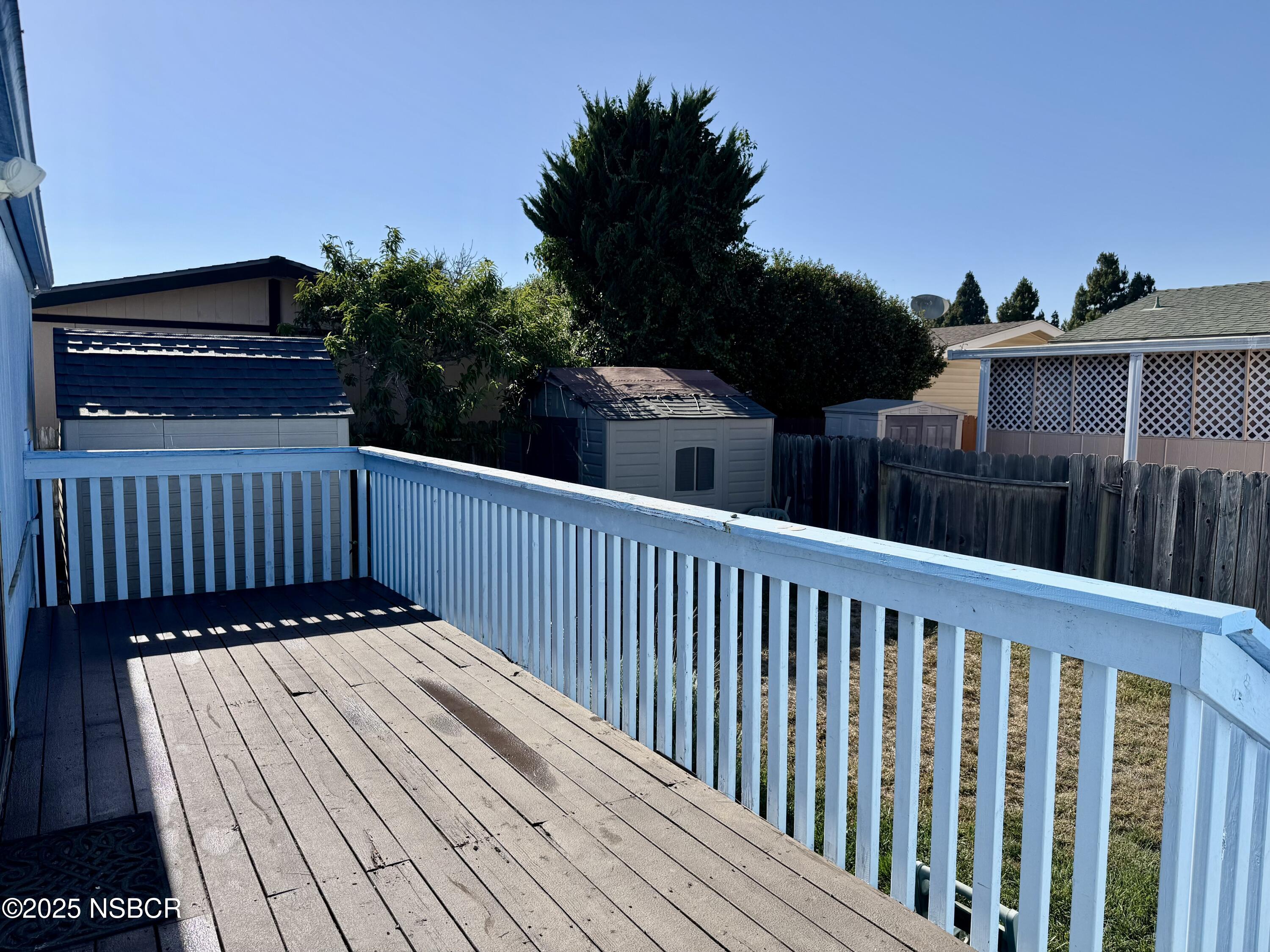 1317 V Street, Unit 58 Lompoc, CA 93436 - Photo 23 of 34 a view of balcony with wooden floor