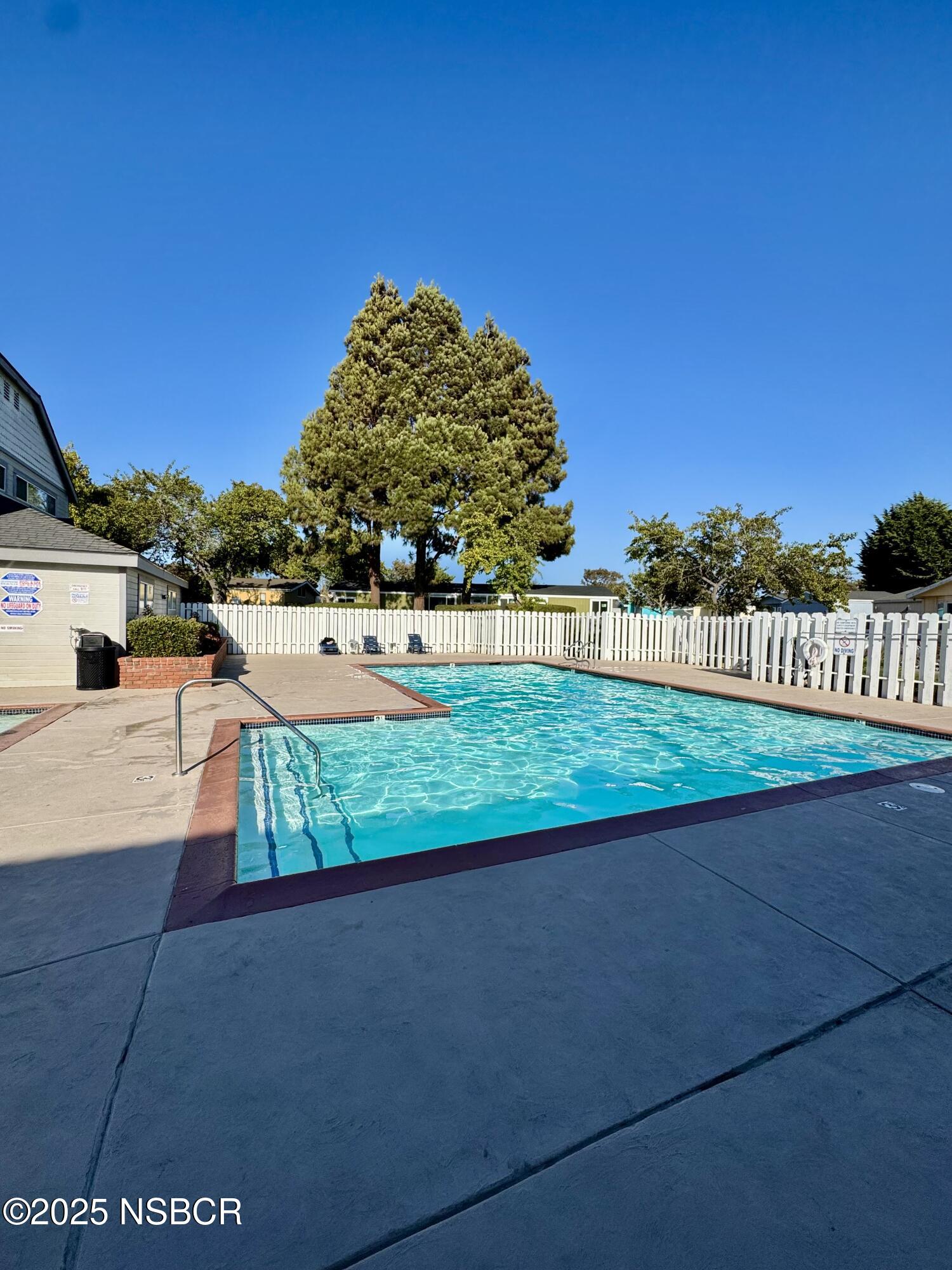 1317 V Street, Unit 58 Lompoc, CA 93436 - Photo 32 of 34 a view of a backyard
