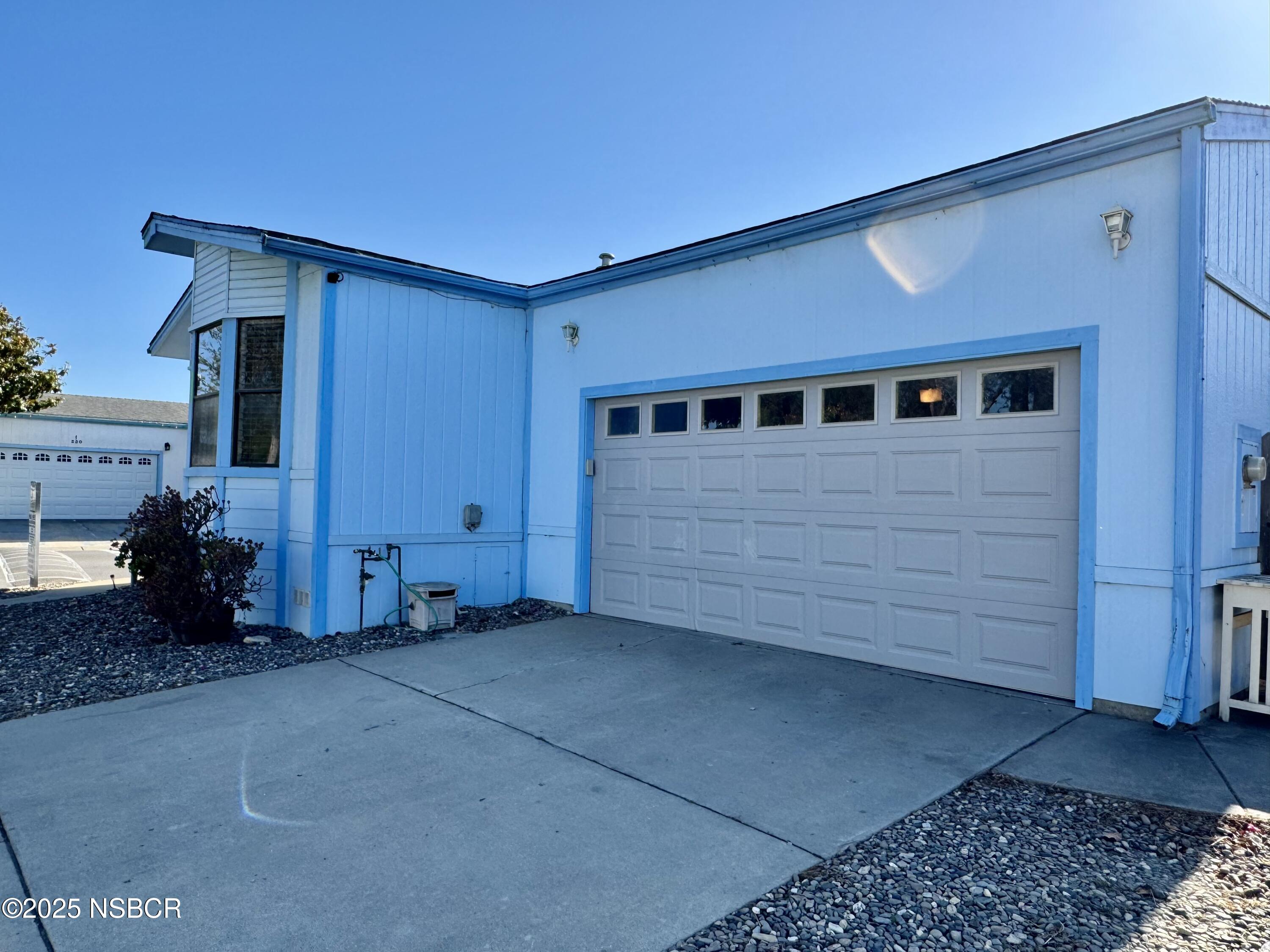 1317 V Street, Unit 58 Lompoc, CA 93436 - Photo 5 of 34 a view of front door of house