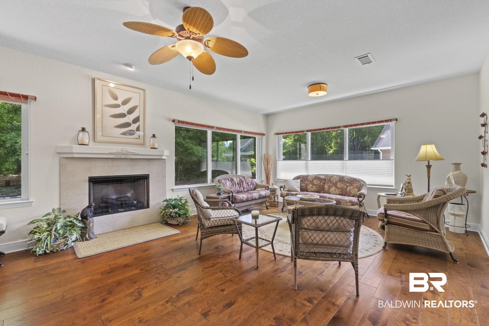 8664 Foxtail Loop Pensacola, FL 32526 - Photo 21 of 64 Living area featuring hardwood / wood-style floors, healthy amount of natural light, and ceiling fan