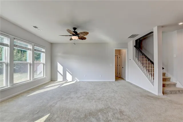 a bathroom with a sink toilet and mirror